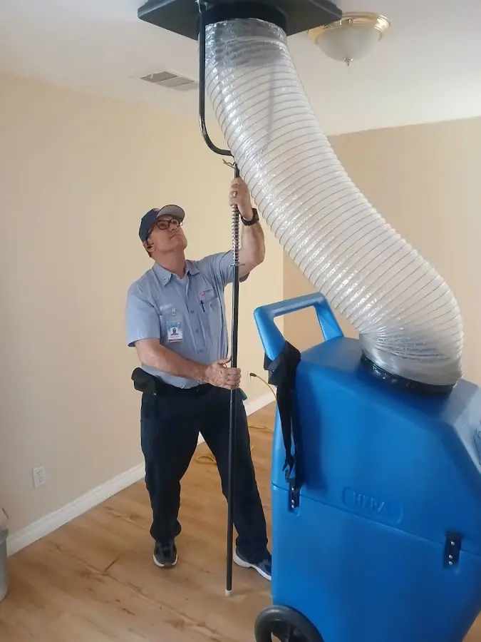 HVAC Installation technician using HEPA equipment in Edina